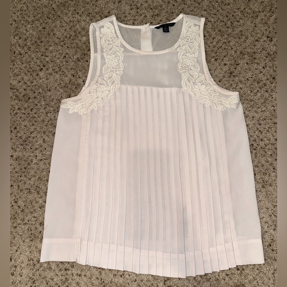 American Eagle sheer sleeveless blouse with ruffles and floral lace accents